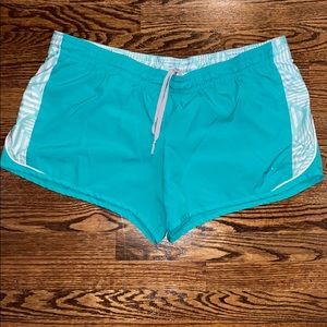 2/$30 NIKE running shorts. XL blue, grey interior.